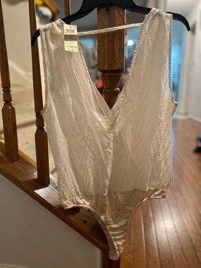 Arden B Ivory Textured Deep V Sleeveless Bodysuit